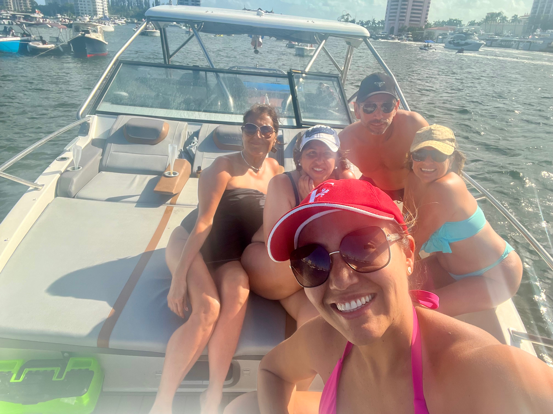 Friends enjoying a sandbar party at Haulover Sandbar on a Fort Lauderdale boat charter