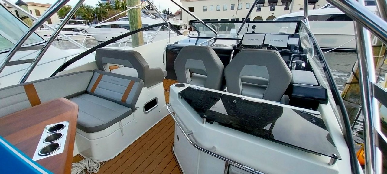 Premium interior helm and cabin seating of the Beneteau Flyer 32 charter boat