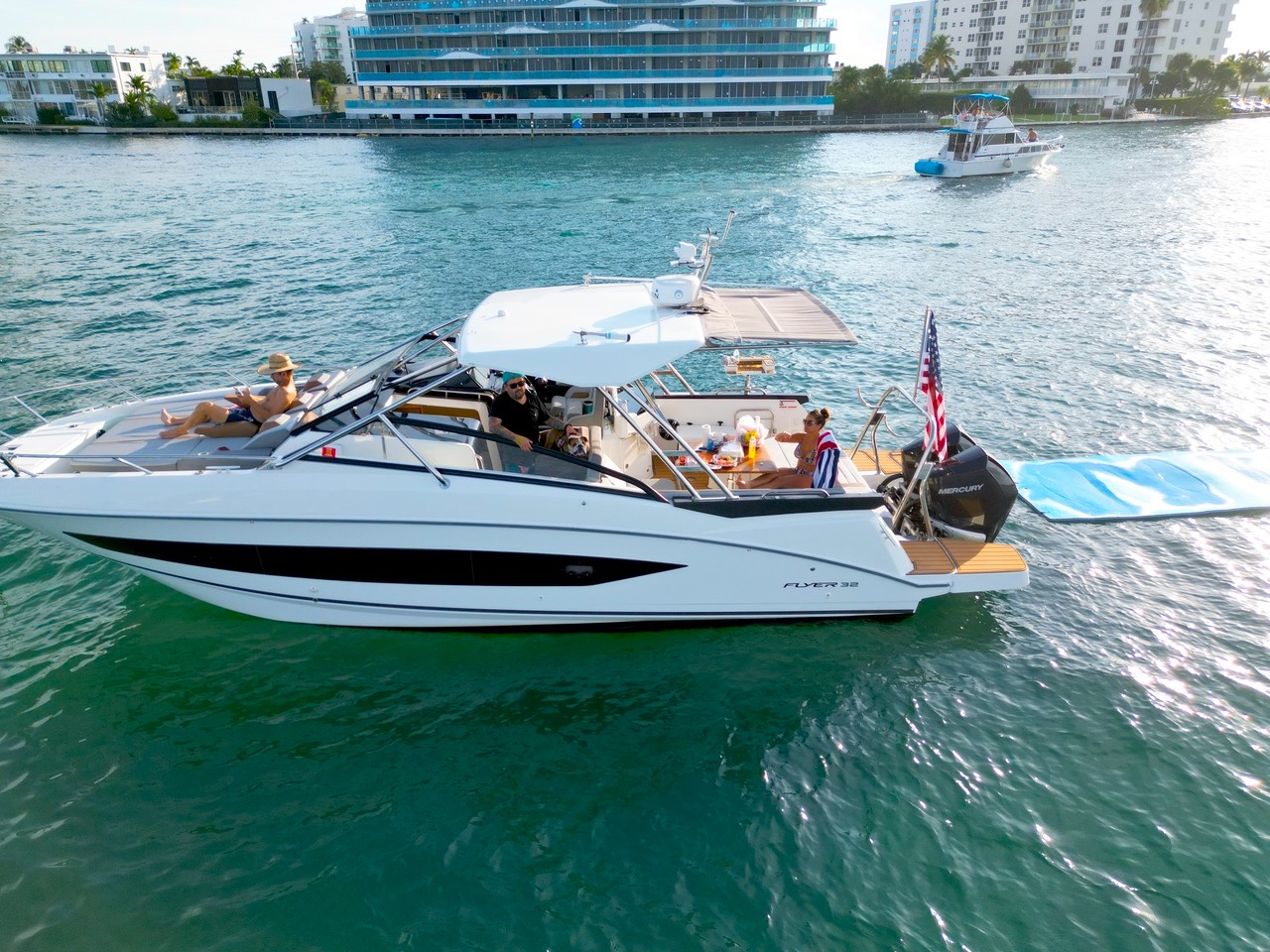 Luxury yacht cruising Fort Lauderdale waters at sunset
